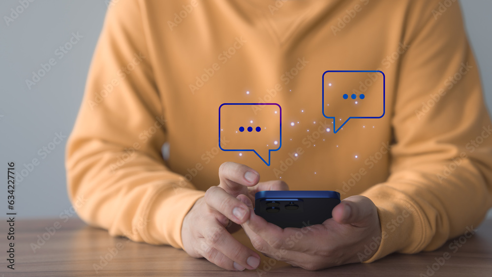 Poster Young man hand using a smartphone typing live chat chatting on application communication digital web and social network concept. Social media application chat box on mobile phone.