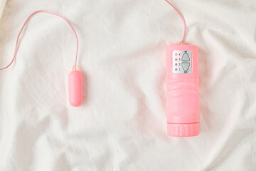Pink Sex Toy on Bed