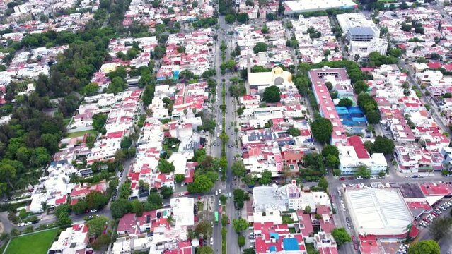 Aerial shot from drone on Guadalupe Avenue towards Chapalita traffic circle, Zapopan, Jal. 