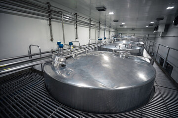 Modern food and drink cellar with stainless steel tanks