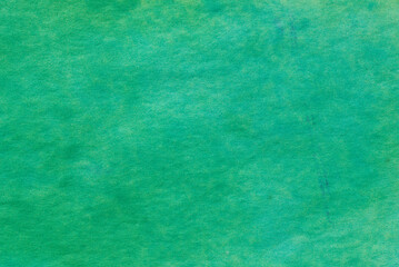 green watercolor painted background texture - 634235180