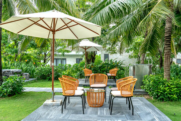 bamboo and rattan tables and chairs in a quiet and green tropical garden