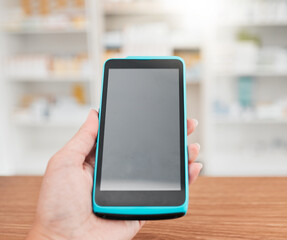 Pharmacist hand, payment machine screen and closeup for credit card, mockup space or pov in store for healthcare. Person, pos tech and promotion in medical sales, shopping or digital commerce at desk