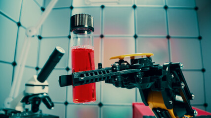 a robot holds a sample of a chemical substance