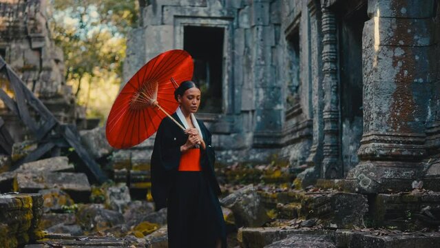 Woman Tours An Abandoned Temple In A Kimono