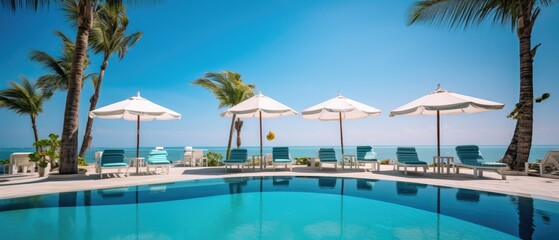 Luxurious swimming pool and loungers umbrellas near beach and sea with palm trees and blue sky, Generative AI