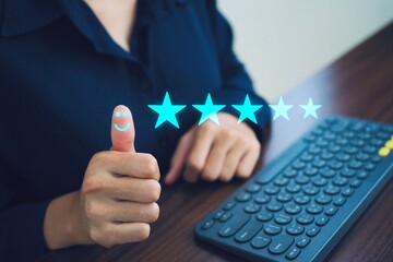 Businessman gives a thumbs up and gives a 5 star satisfaction rating. Symbol of excellent service. good customer service ,Service concept.