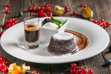 christmas cake with berries and coffee