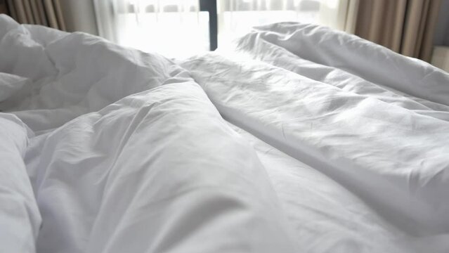 messy bed in early morning , messy bed after waking up 