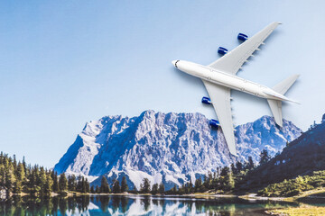 Fototapeta premium plane flying over the snow-capped mountains. passenger airplane in the clouds. travel by air transport. flying to the top of the airliner. nobody