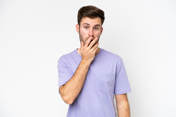 Young caucasian man isolated on white background surprised and shocked while looking right