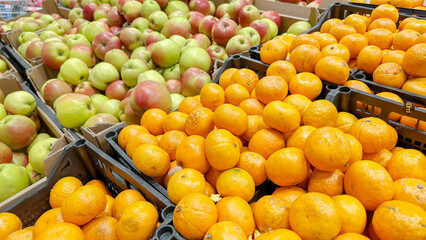 ripe tangerines on the store counter