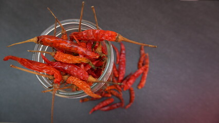 Dried peppers, garlic, red onion, curry powder, kimchi, hot spicy ingredients.