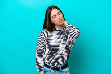 Young caucasian woman isolated on blue background with neckache