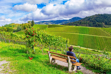 Woman resting on vineyards