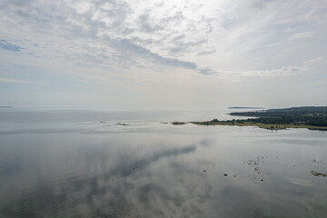 Aerial view of maritime sea landscape, seascape. Wild nature and water. Stones, grass and water. Untouched nature. National nature reserve, national park.