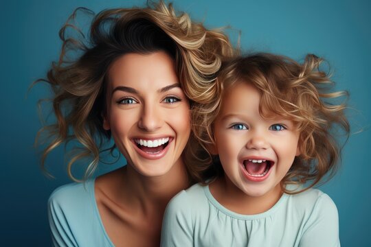 Beautiful portrait of a mother and her little child making faces, light blue background, studio photos. created by generative AI technology.