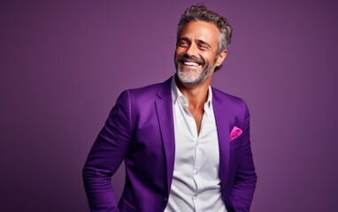 Fototapeta premium Ultra handsome Caucasian, smiling and laughing, wearing bright clothes. Bright solid purple background. created by generative AI technology.