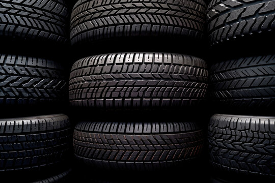 an arrangement of car tires, in the style of frontal perspective.