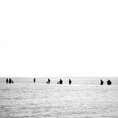 Foto op Aluminium People walking in the middle of the Andaman see in the island of Ko Yao in southern Thailand. © Leckerstudio