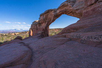hiking the broken arch trail in arches national park, utah, usa