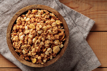 Granola Breakfast in Wooden Bowl. Top View