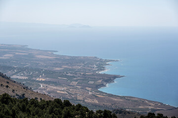 Panoramic view of the mountains of the Gorge and the Sea against the backdrop of the blue sky on the island of Crete Sunny Day