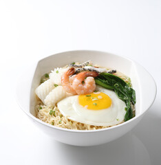 cook Japanese instant noodle mee soup with seafood fish, prawn, octopus, fried egg and vegetables on bowl chopstick on white vintage newspaper background asian chef halal food restaurant banquet menu