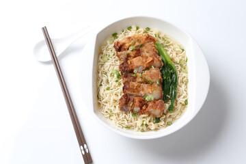 cook Japanese instant noodle mee soup with chicken chop cutlet and vegetables on bowl chopstick on...