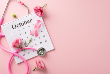 October's Pink Ribbon Campaign is here. Top view of calendar and pink ribbon, stethoscope and...