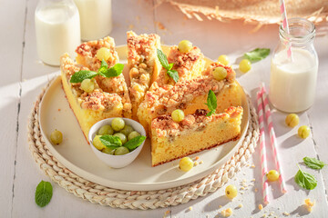 Fresh gooseberry butter cake as traditional dessert.