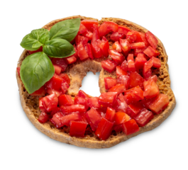 Italian dry bread friselle with chopped cherry tomatoes and basil leaves dressed with olive oil poured from oil bottle - isolated