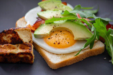 Nutritious Brunch with Toasted Bread, Fried Egg, and Fresh Arugula