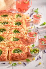 Homemade gooseberry yeast cake served with red tea.