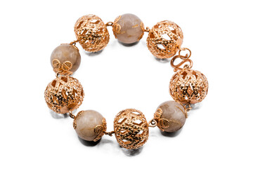 Old bangle jewelry has gold color isolated on white background,macro photo,has path