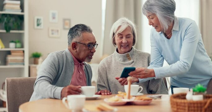 Senior people, phone and friends talking at a table in a retirement home. Elderly women and a man relax together with a smartphone for memory, pension discount and asset or savings plan website
