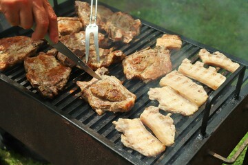 Pork chop on a steaming grill, medium roast