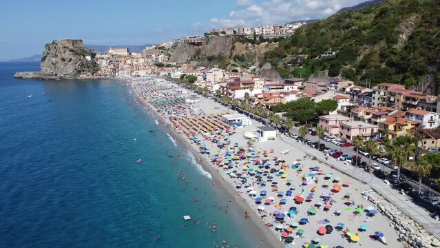 Top view of Scilla Vista dall'alto - bellissima Ripresa video 4k fatta con il drone mostra la spiaggia affollata di Scilla (Rc) nel video si vede tutto il lungomare fino al Castello Ruffo