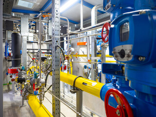 Boiler room. Heating system inside plant. Boiler room with pipes. Heating building with gas. Modern...