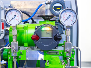Industrial gas equipment. Green compressor with manometers. Equipment for metering used gas. Boiler...