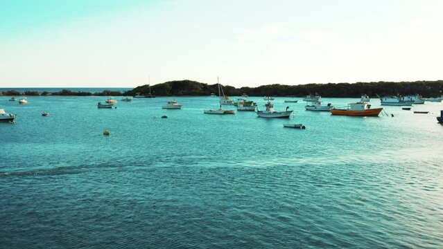 Porto Cesareo, Isola dei conigli e le barche ancorate nel mare turchese -  Salento, Puglia, Italy