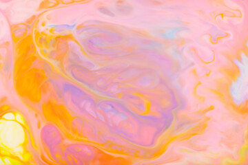 Fototapeta na wymiar Ink Swirls and Colorful Stains: Fluid Art Fantasy on Blurred Background