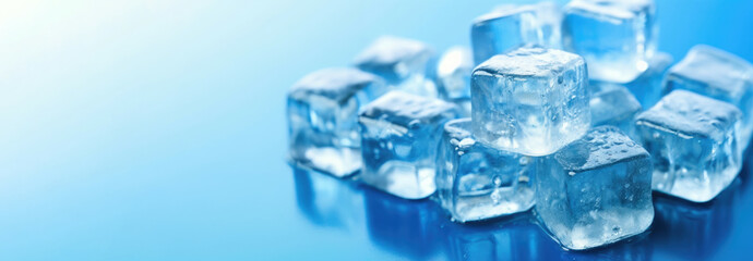 Clear Melting Ice Cubes on Blue Background - Banner with Negative Space