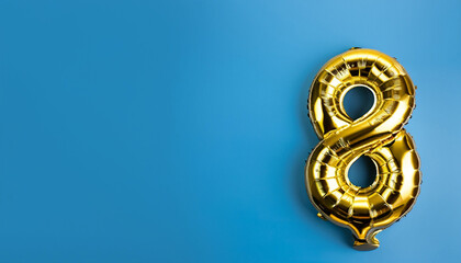 Banner with number 8 golden balloon with copy space. Eight years anniversary celebration concept on a blue background.