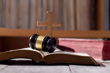 Holy bible book and judge's gavel on table background. Judicial system, constitution, democracy,...