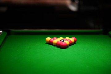 Snooker balls on the snooker table surface. Sport equipment object photo, selective focus.