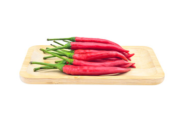 fresh group of red chili in square wood plate on white background closeup,isolate