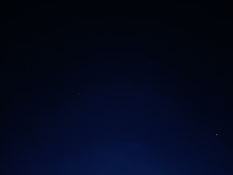 Blue sky at night. silhouette of building at night.