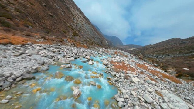 The glacier river Dudh Koshi in gorge of Sagarmatha national park in the Himalayas Mountains, Nepal 🇳🇵Near  Machermo village. One of 3 routes to Everest Base Camp.
Shot on fully manual FPV drone