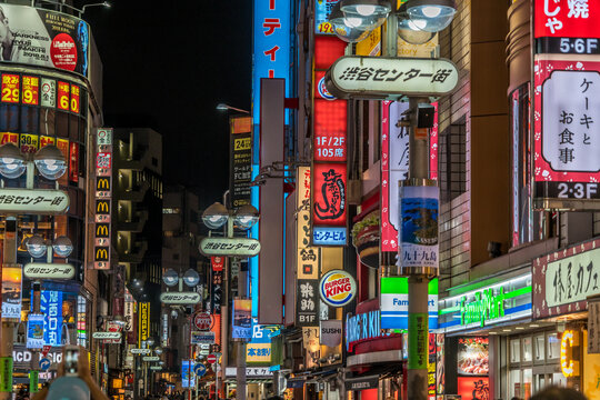 Shibuya, Tokyo - August 27, 2018 : Night scene in Shibuya district. Restaurants and shops with colorful billboards